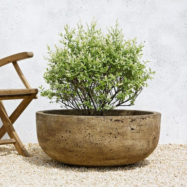 Mesa Large Planter on gravel near wooden chair