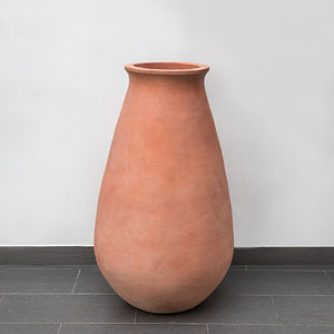 Oliviere Jar Planter - Terra Cotta - S/1 on concrete against light gray wall