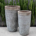 Orion Planter Set of 2 Beachcomber Grey Mist in the backyard