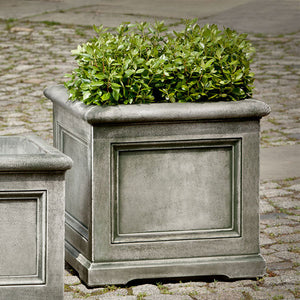 Orleans Planter, Large on stone filled with plants