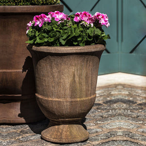 Pascal Urn, Small filled with pink flowers beside large planter