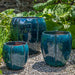 Rib Vault Planter - Indigo Rain - S/3 on gravel in the backyard