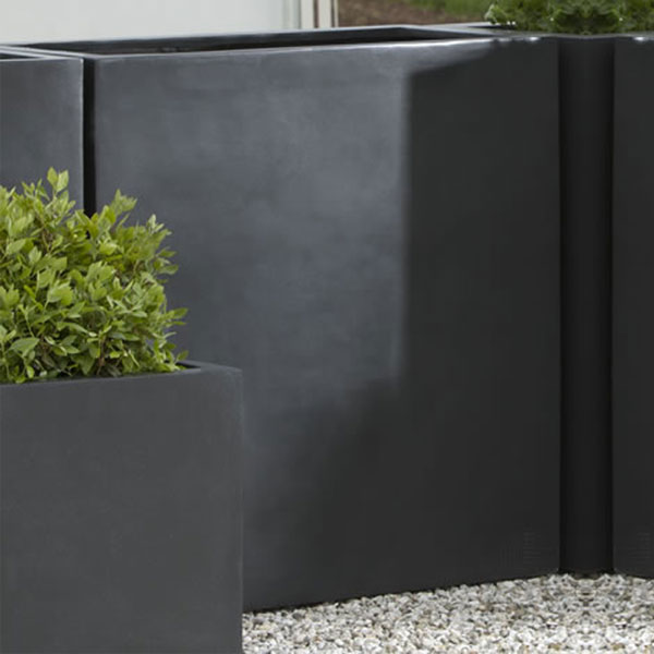 Sandal Planter - 361836 - Onyx Black Lite S/1 on gravel in backyard