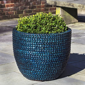 Sisal Weave Planter Set of 3 Indigo Rain filled with plants in the backyard