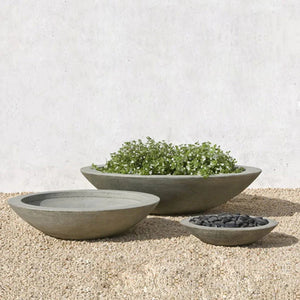 Small Low Zen Bowl Planter on gravel against cream wall