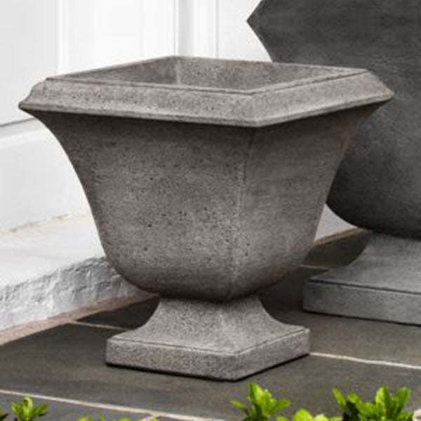 Small Trowbridge Urn Planter on concrete in the backyard