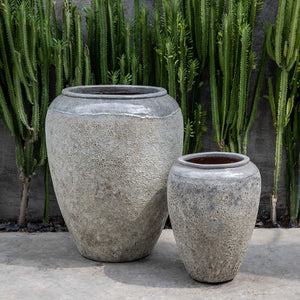 Sureda Jar Planter - Angkor Grey Mist - Set of 2 against cactus in the backyard