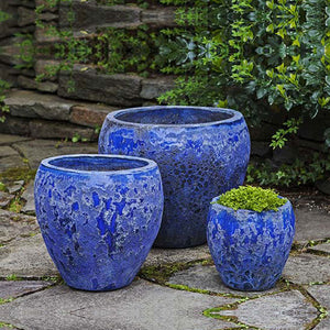 Symi Planter - Angkor Blue - Set of 3 on concrete in the backyard
