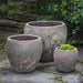 Symi Planter - Angkor Green Mist - Set of 3 on concrete in the backyard