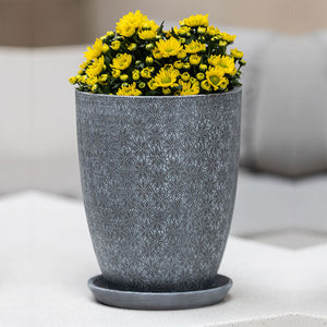 Tall Marguerite Tapered Etched Grey Planter Set of 4 filled with yellow flowers