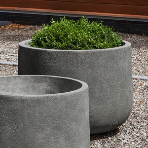 Tribeca Planter, Medium filled with plants beside an empty planter