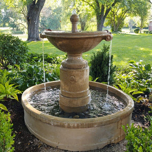 Upclose borghese in basin fountain running in backyard