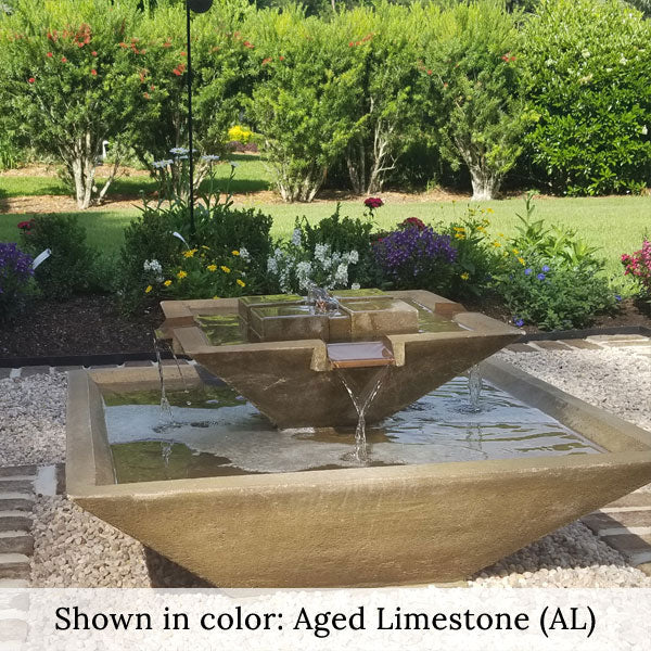 Upclose facet fountain on gravel running